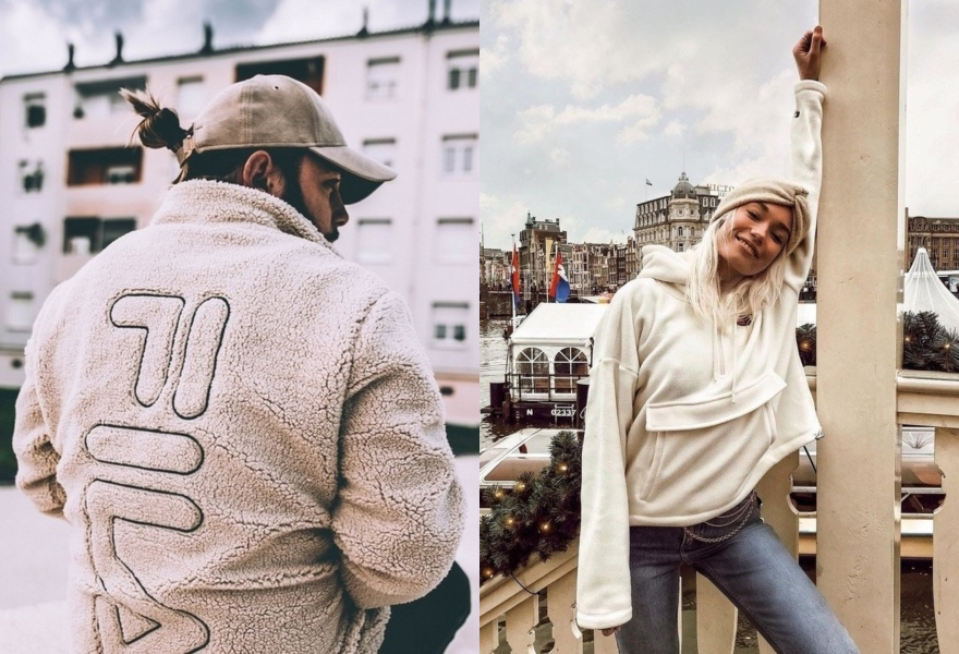 Mann mit FILA Teddy Jacke und Frau mit Champion Fleece Hoodie