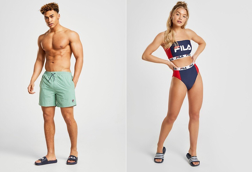 Mann in hellgrüner Fila Badehose und Frau in blauroten Fila Bikini